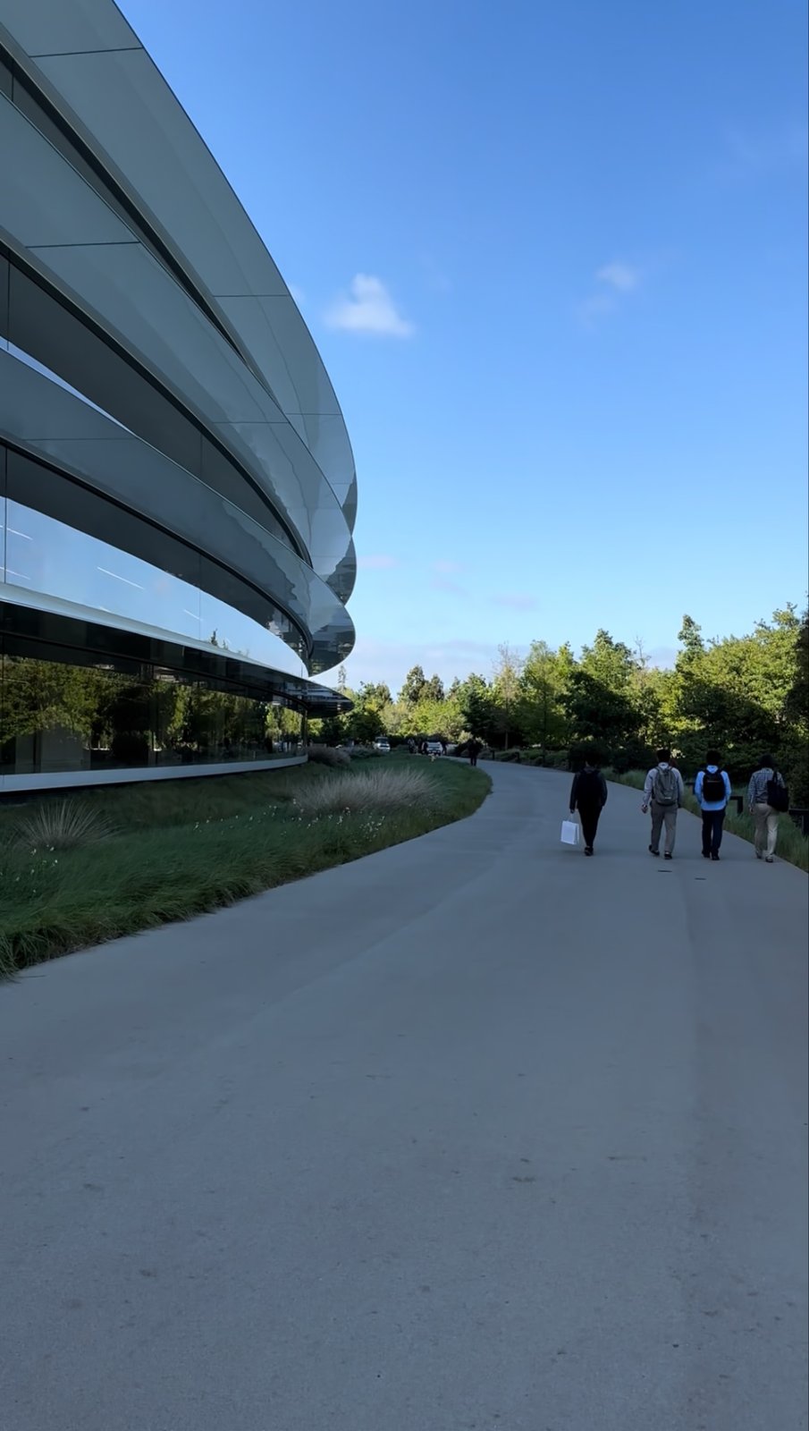 The Apple Park ring building from the walking path